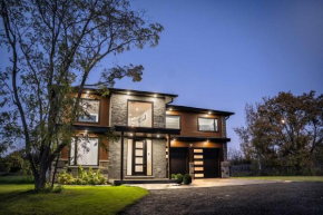 Riverfront Retreat Modern Home w Sauna and Hot Tub